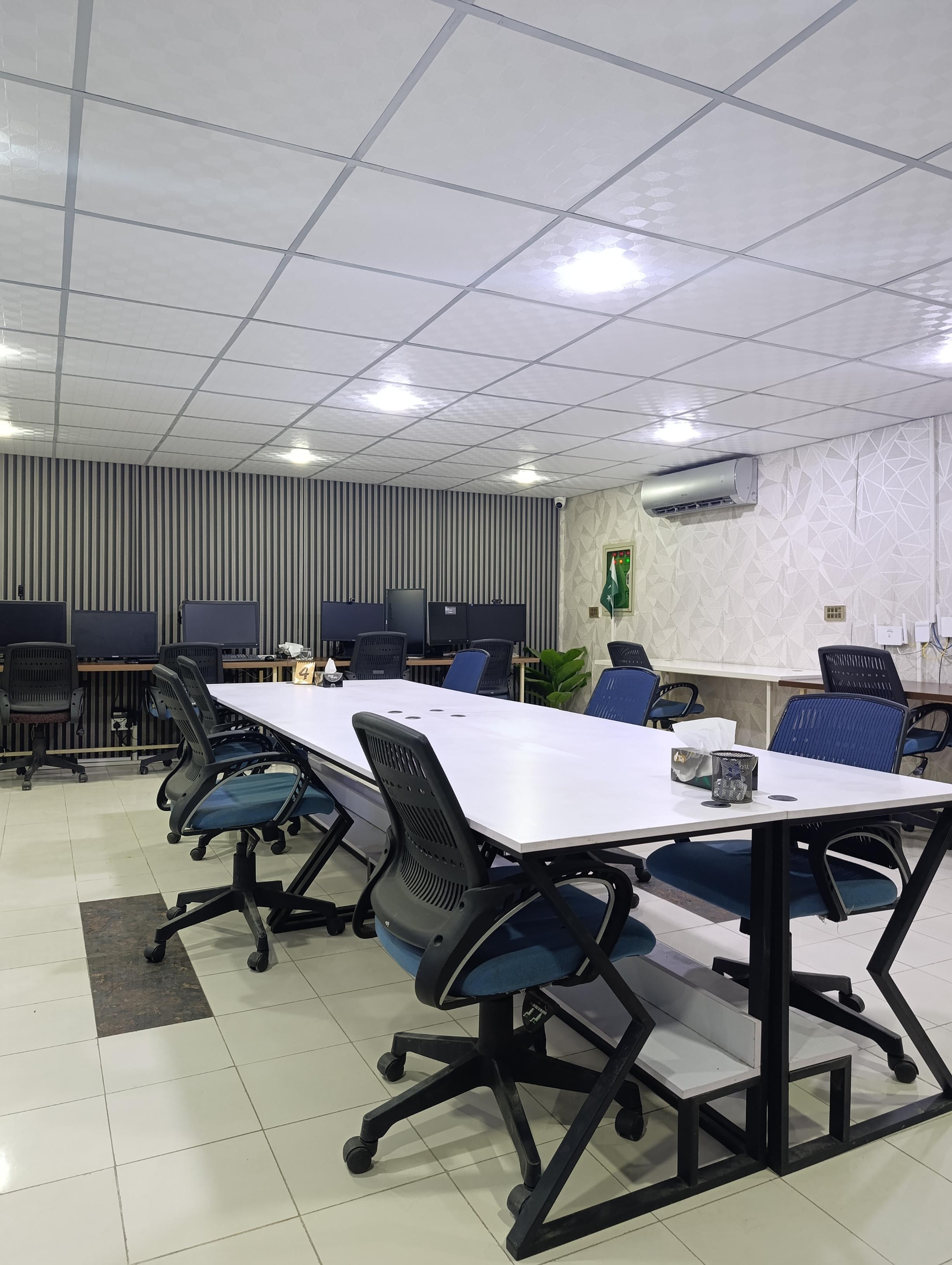 Conference area with team collaborating